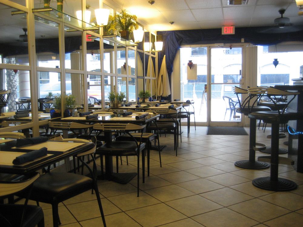 Warm, softly lit dining room at Yatri Indian Restaurant