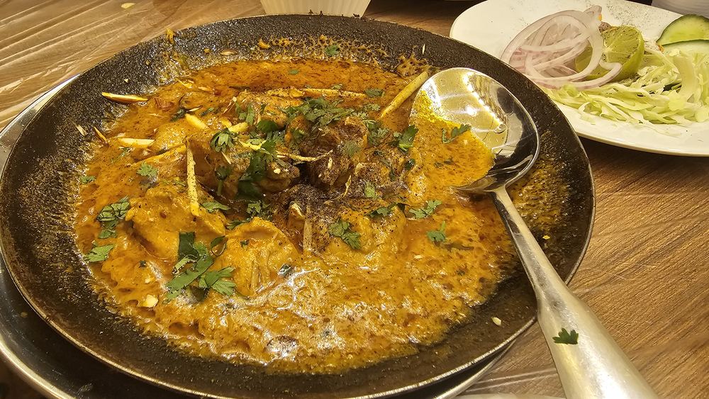 Slow-cooked lamb curry with regional spices