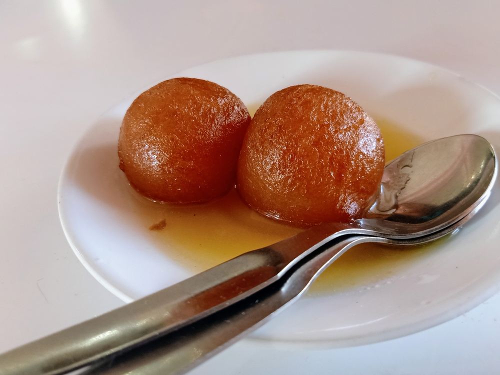Gulab jamun dessert in sugar syrup